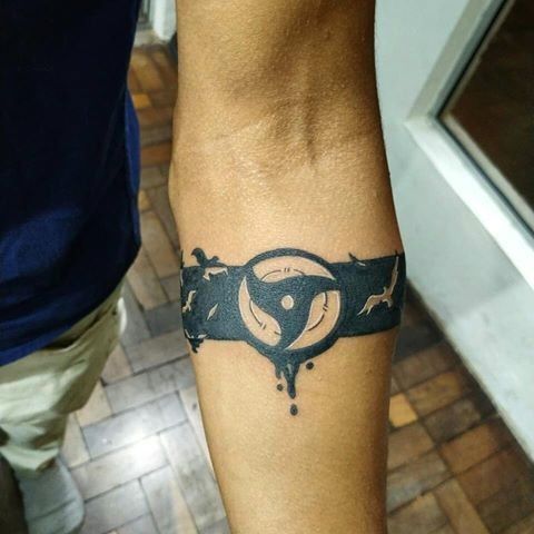 Sharingan and birds arm band tattoo design for men with naruto theme tattoo ideas