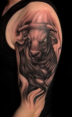 Realistic Taurus tattoo design for men on bicep tattoo ideas