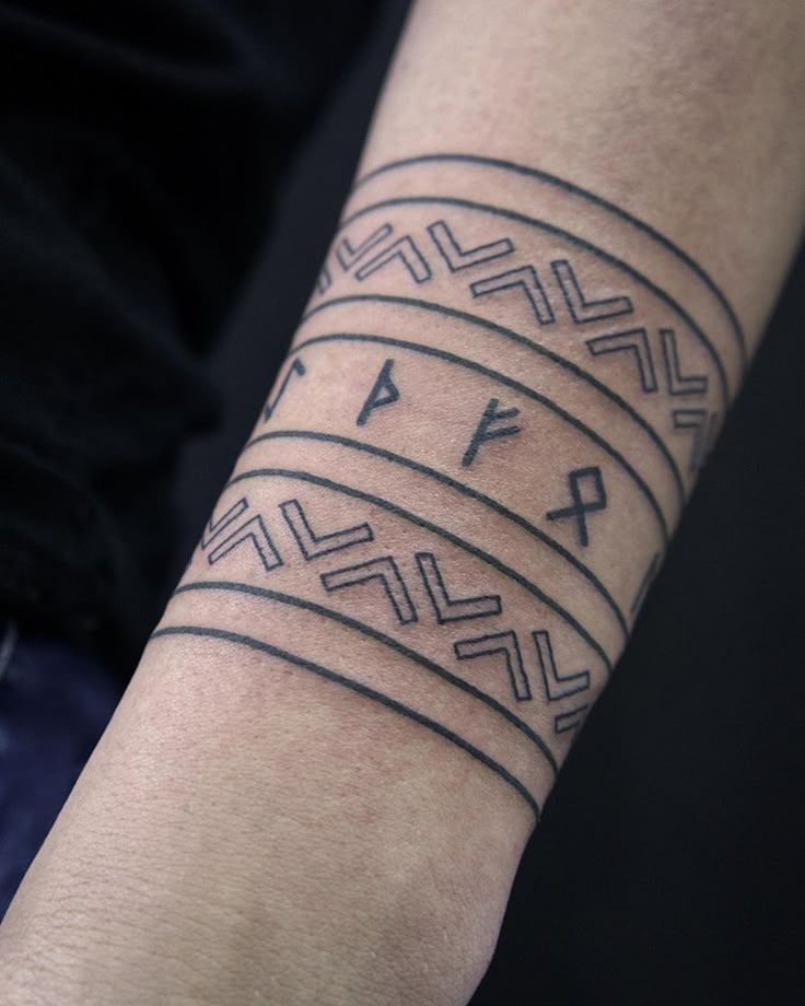 Norse geometric tattoo design for men and women on arm band tattoo ideas