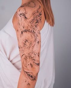 Realistic phoenix and flower tattoo design for women on half sleeve and shoulder tattoo ideas