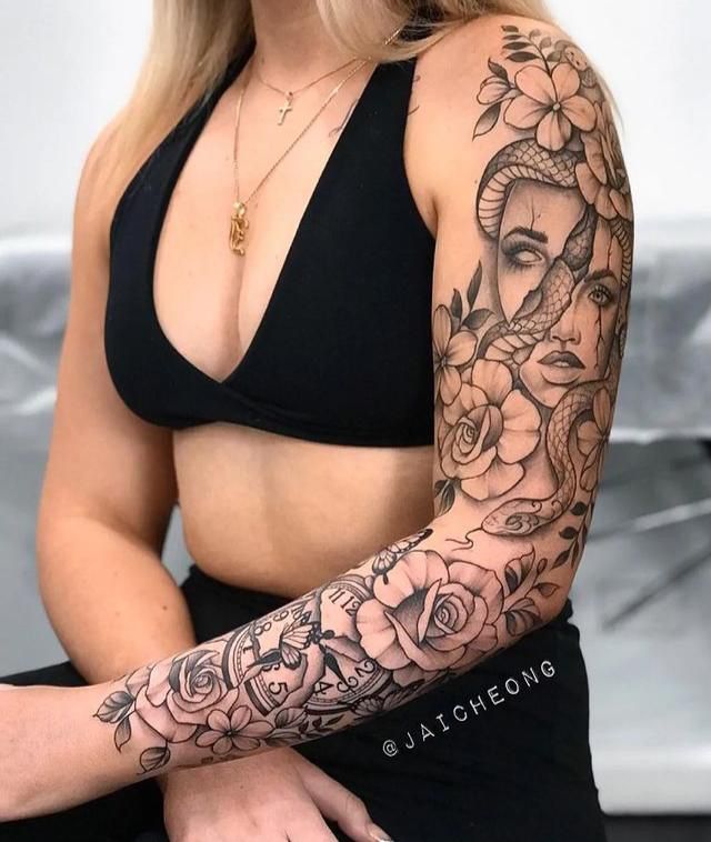 Realistic snake, rose, and flower tattoo design for women on arm and full sleeve tattoo ideas