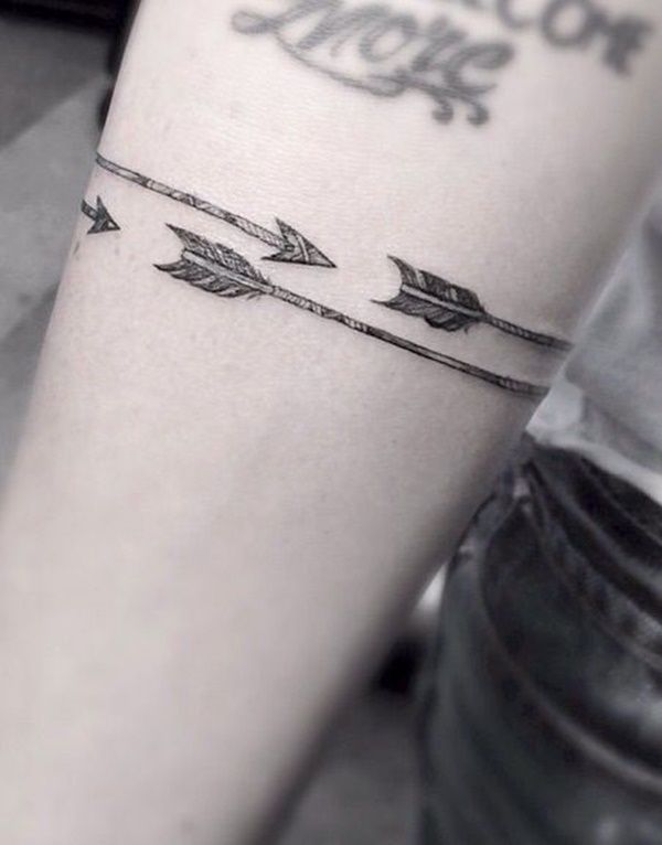 Linework arrow tattoo design for women on arm band tattoo ideas