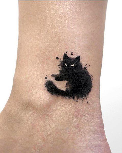 Blackwork splash ink cat tattoo design for women and men on ankle tattoo ideas