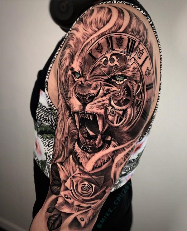 Realistic lion and rose with clockwork tattoo design for men on bicep tattoo ideas