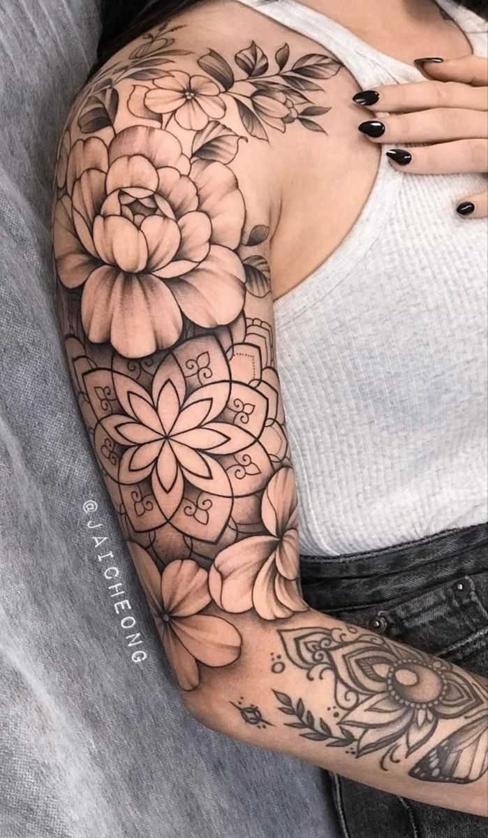 Realistic floral and mandala tattoo design for women on arm tattoo ideas