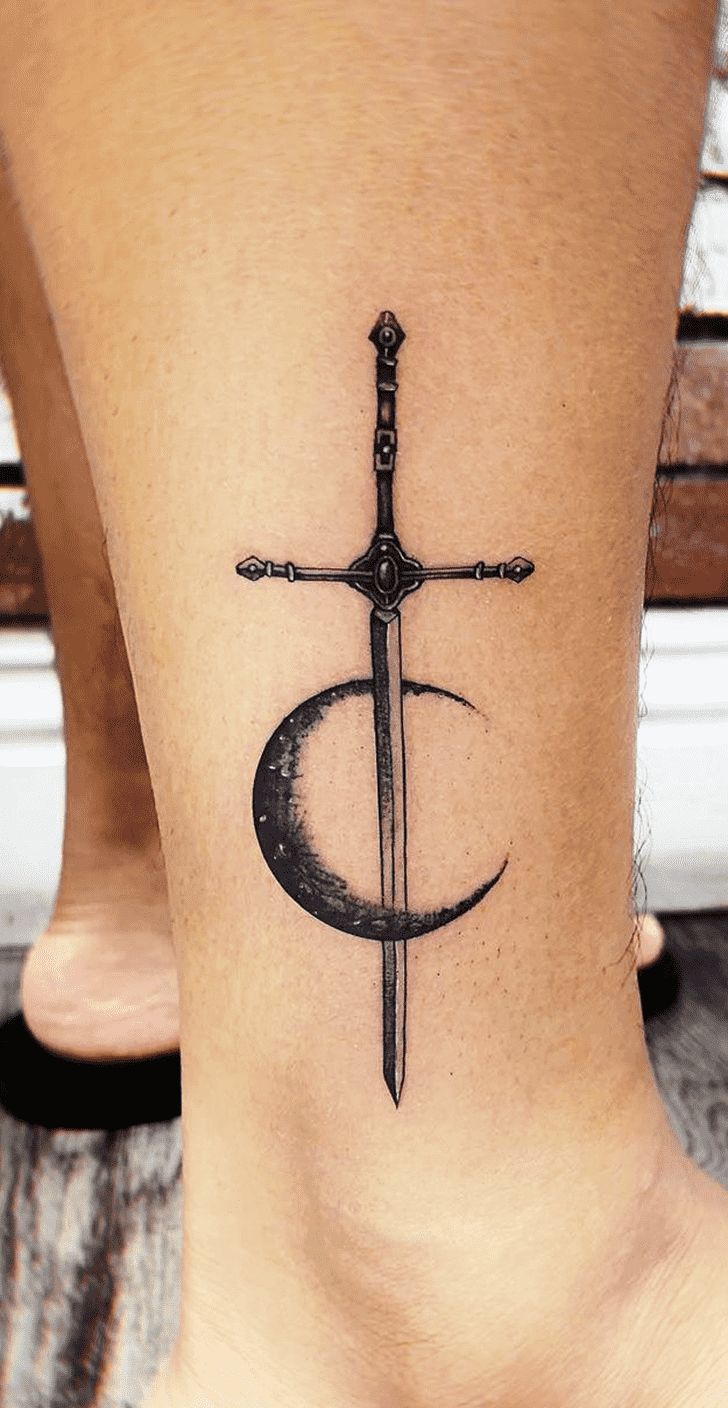 Blackwork sword and moon tattoo design for men and women on ankle tattoo ideas