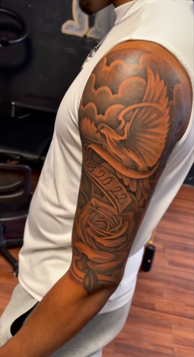 Realism dove and rose tattoo design for men on arm tattoo ideas