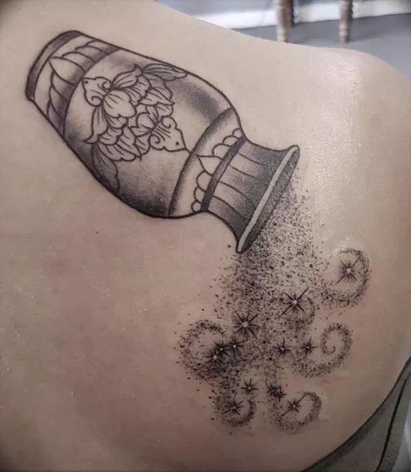 Black and Grey Aquarius and flower tattoo design for women on shoulder tattoo ideas