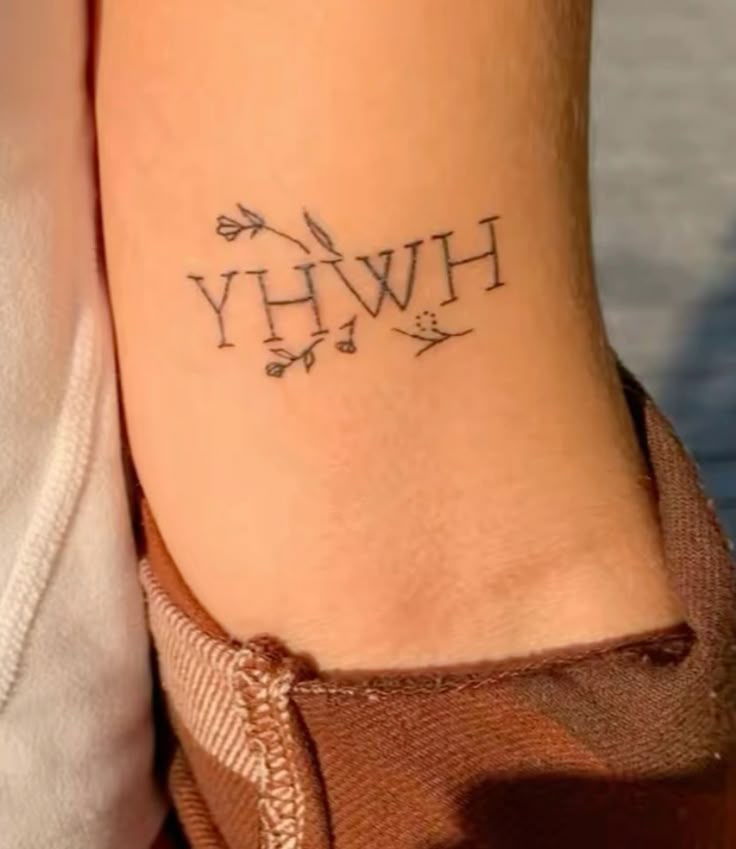 Fine Line floral and word tattoo design for women on arm tattoo ideas