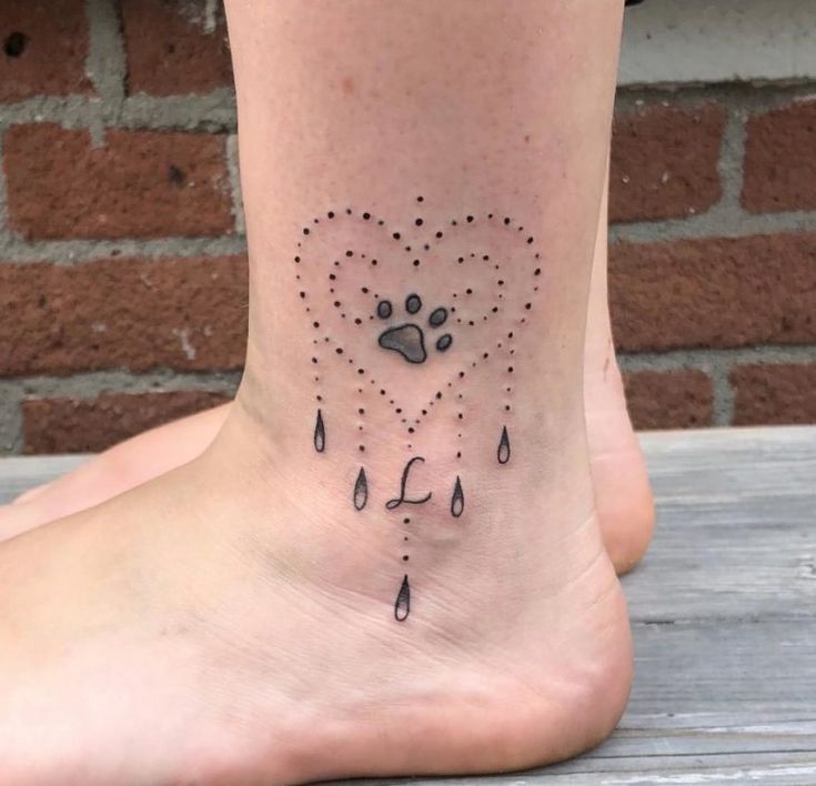 Dotwork heart and paw print tattoo design for women on ankle tattoo ideas