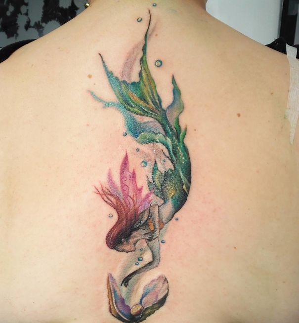 Watercolor mermaid tattoo design for women on back and chest tattoo ideas