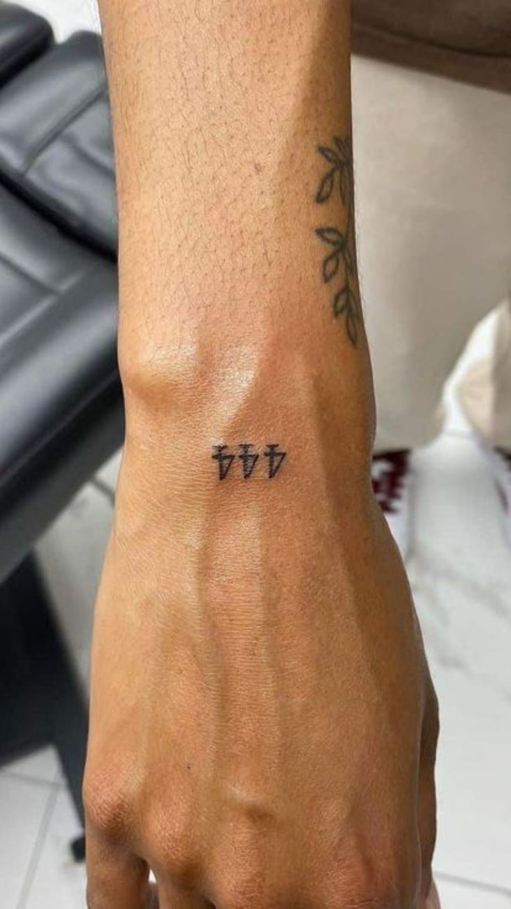 Minimalist angel number 444 tattoo design for men on wrist tattoo ideas