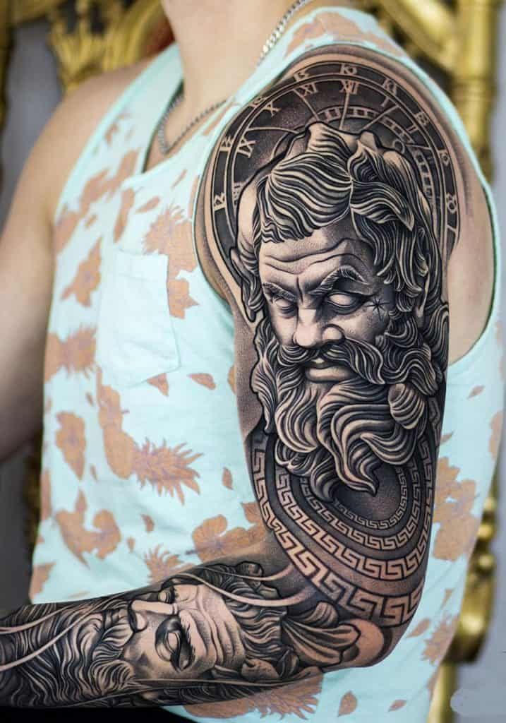 Realistic Greek god tattoo design for men on arm and shoulder tattoo ideas