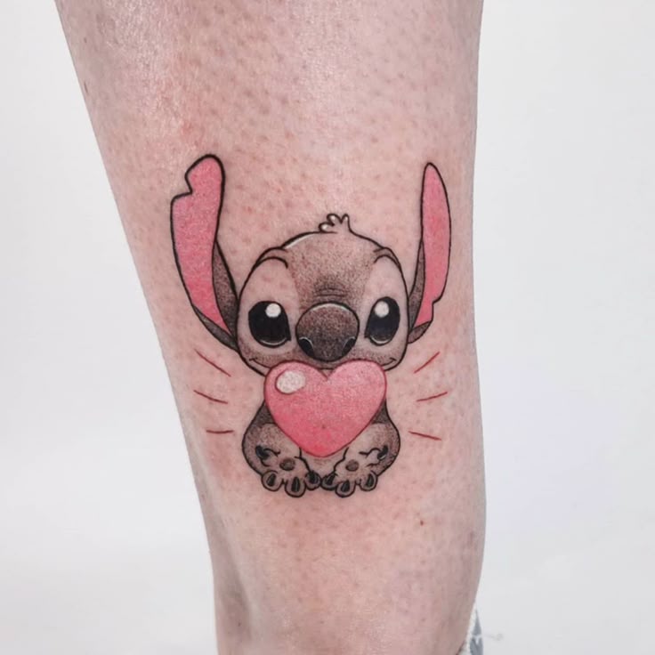Anime Stitch and heart tattoo design for women on leg tattoo ideas