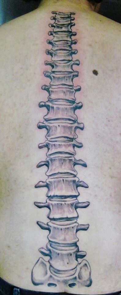 Realistic spine tattoo design for men and women on back tattoo ideas