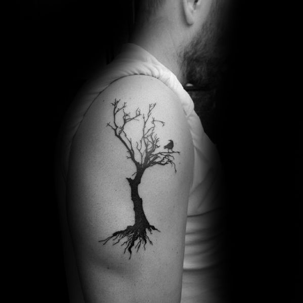 Blackwork tree tattoo design for men on shoulder and upper arm tattoo ideas