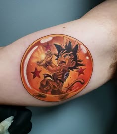 Realistic Dragon Ball Z tattoo design for men on bicep tattoo ideas