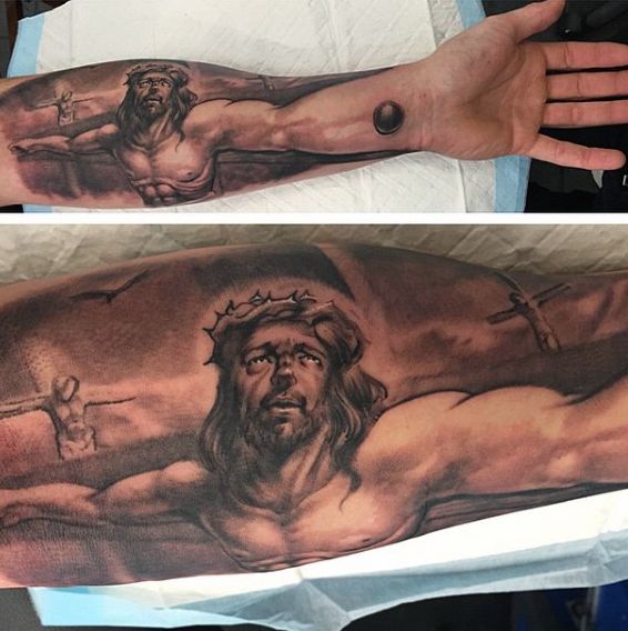 Realistic Jesus and cross tattoo design for men on arm tattoo ideas