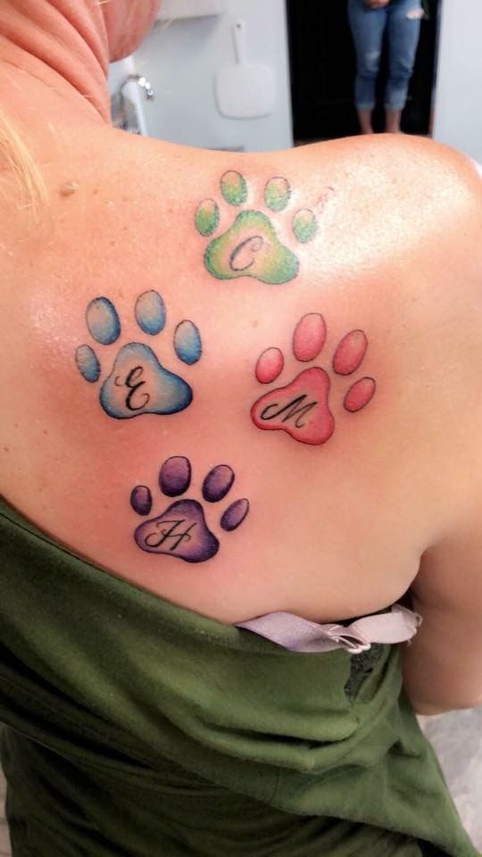 New School paw print tattoo design for women on shoulder tattoo ideas