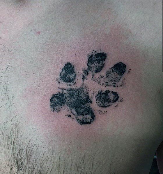 Black and Grey paw print tattoo design for men on chest tattoo ideas