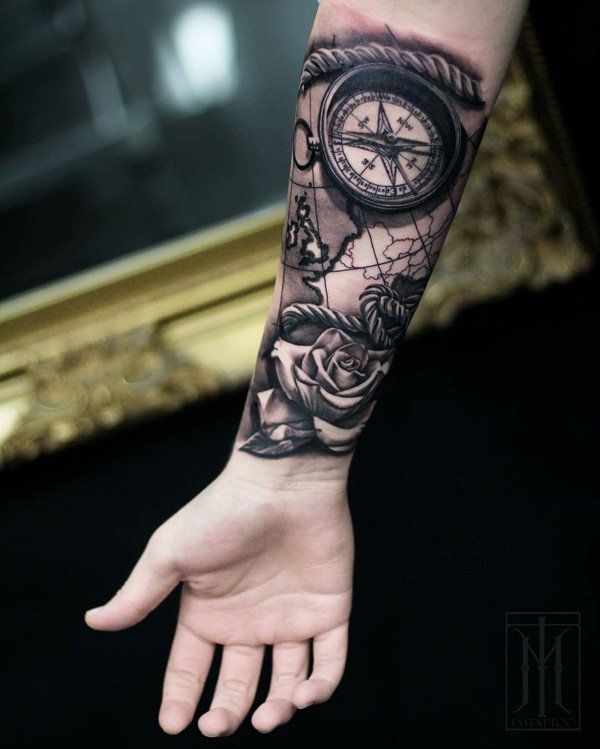 Realistic rose and compass map tattoo design for men on forearm tattoo ideas