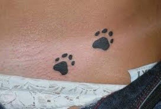 Minimalist paw print tattoo design for women on hip tattoo ideas