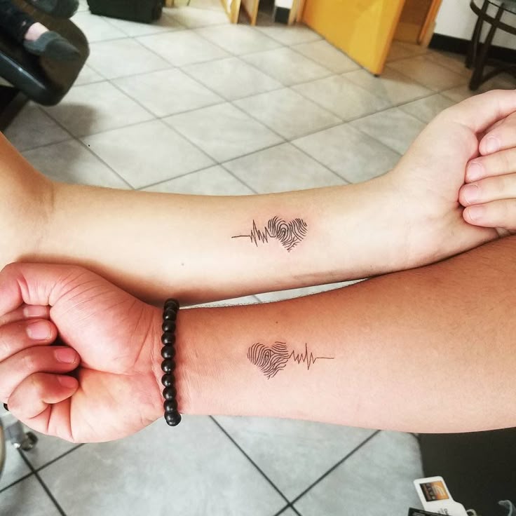 Minimalist heartbeat fingerprint heart tattoo design for men and women tattoo ideas