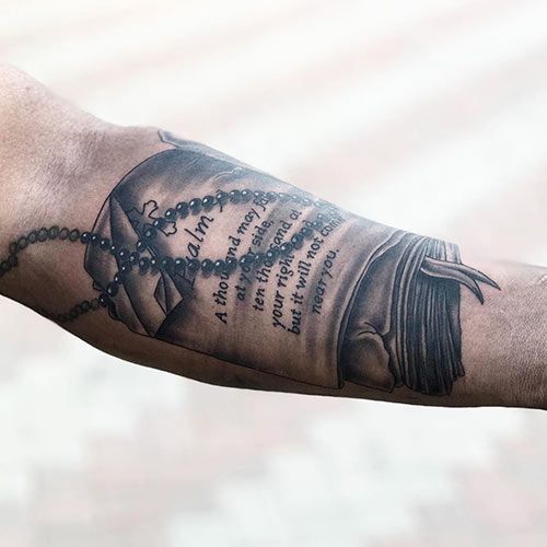 Realistic Bible verse and cross tattoo design for men on forearm tattoo ideas
