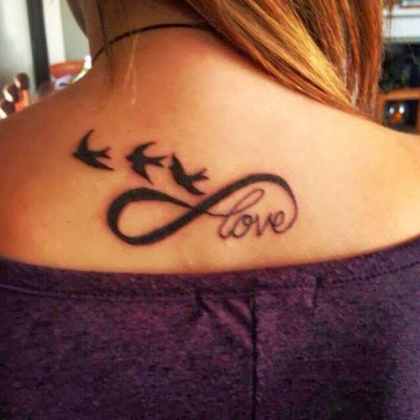 Infinity and bird script tattoo design for women on back tattoo ideas