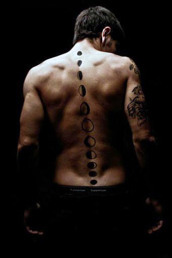 Minimalist moon and sun tattoo design for men on back tattoo ideas