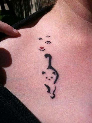 Minimalist cat and heart tattoo design for women on chest tattoo ideas