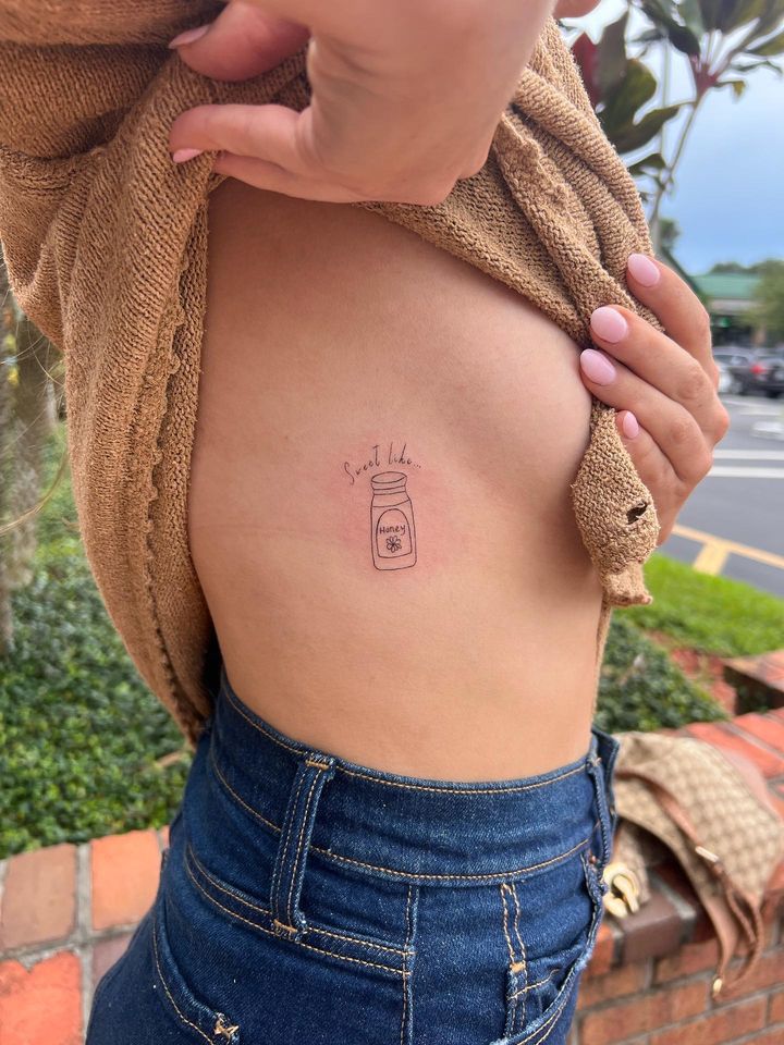 Fine line honey jar tattoo design for women with quote on rib tattoo ideas