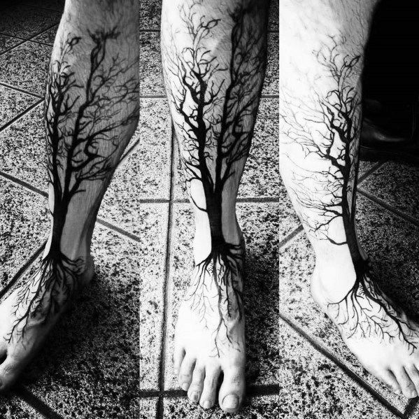 Black and grey tree tattoo design for men on leg and foot tattoo ideas