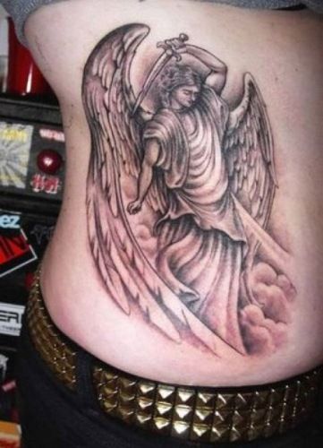 Realistic angel with sword tattoo for men and women on rib tattoo ideas