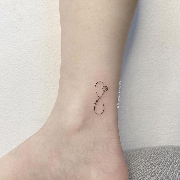 Fine line infinity and flower tattoo design for women on ankle tattoo ideas