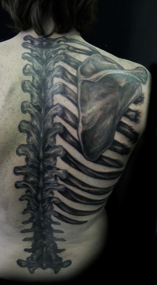 Realistic rib cage tattoo design for men and women on back, chest tattoo ideas