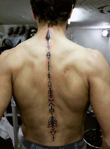 Geometric arrow and tree tattoo design for men on back tattoo ideas