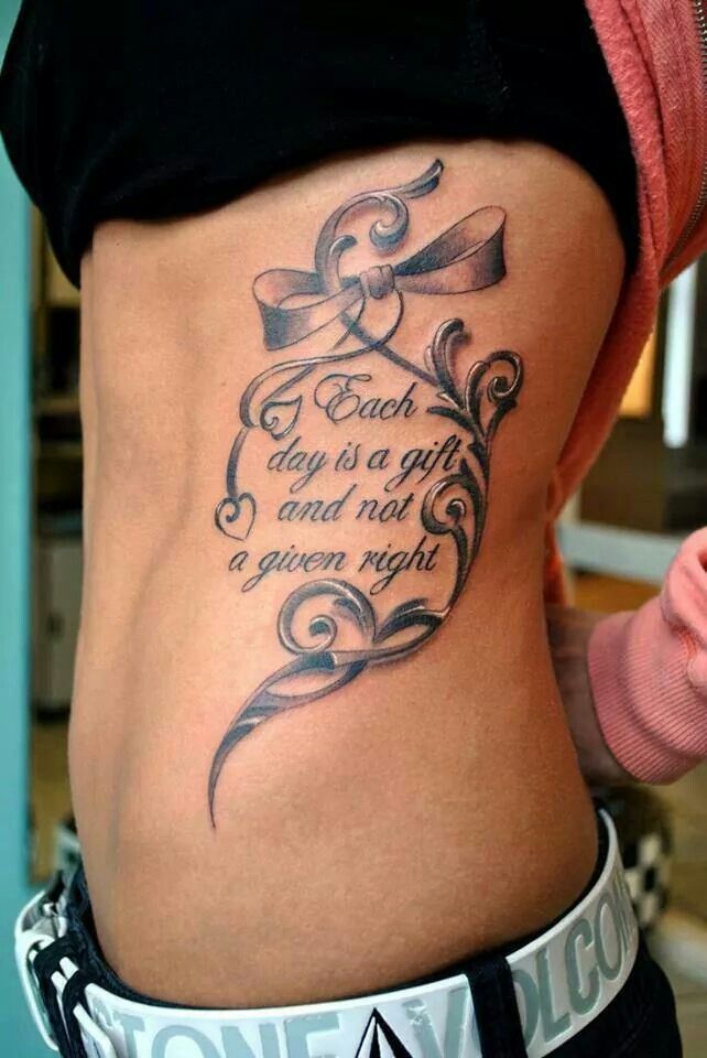 Script quote tattoo design for women on rib tattoo ideas