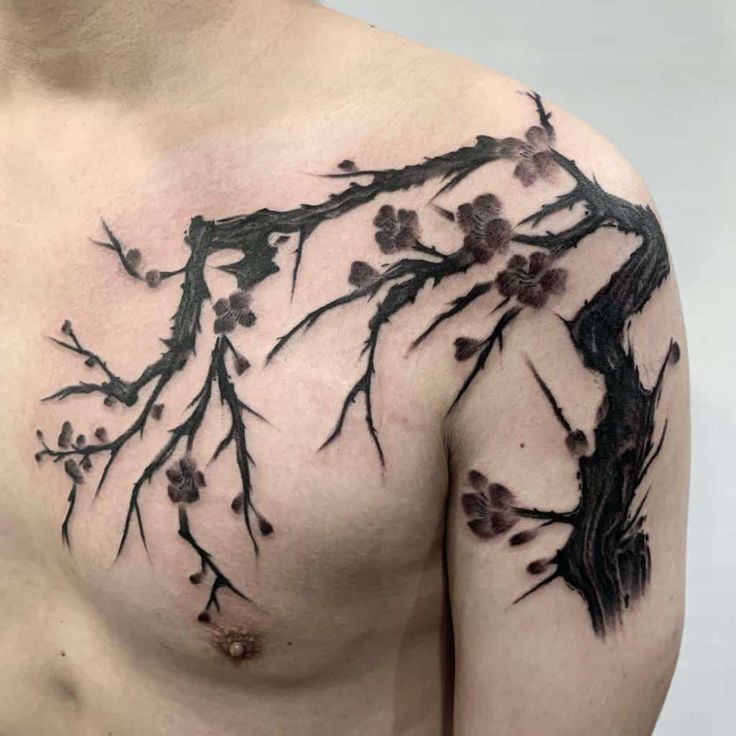 Black and Grey floral tree tattoo design for men on chest and shoulder tattoo ideas