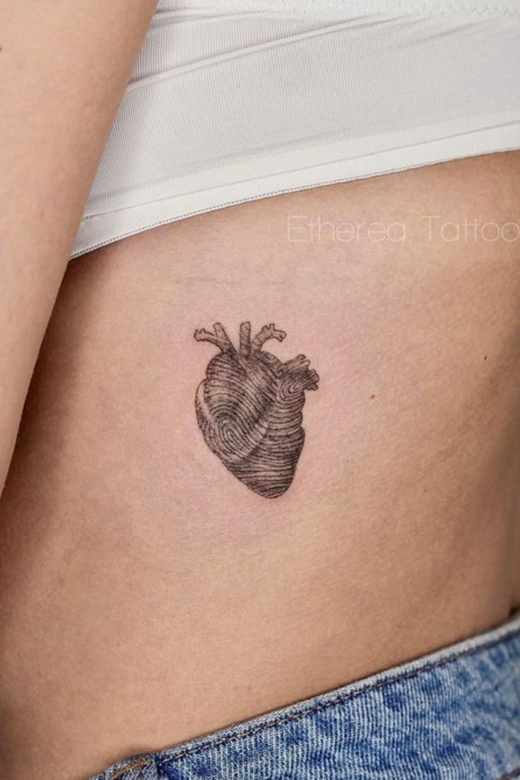 Heart fingerprint tattoo design for men and women on rib tattoo ideas