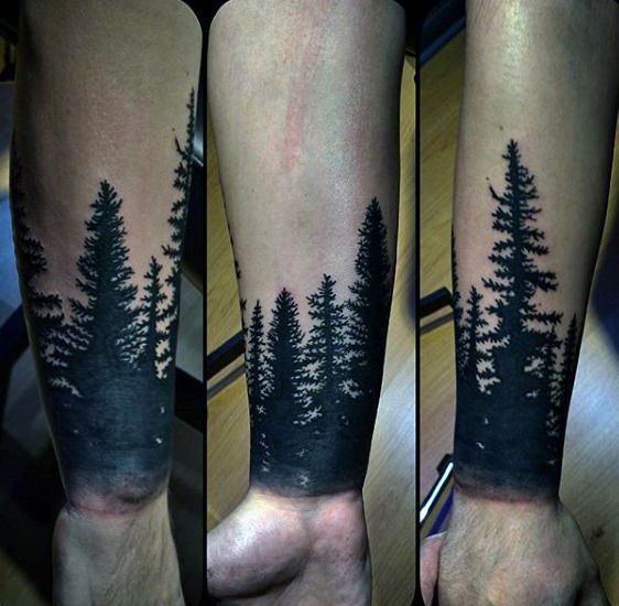 Forest silhouette tattoo design for men on forearm and wrist tattoo ideas