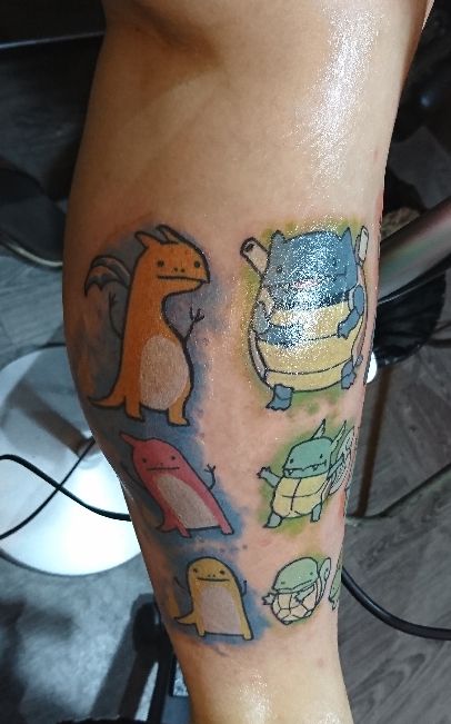 Cute anime dragon and Pokemon tattoo design for women on leg tattoo ideas