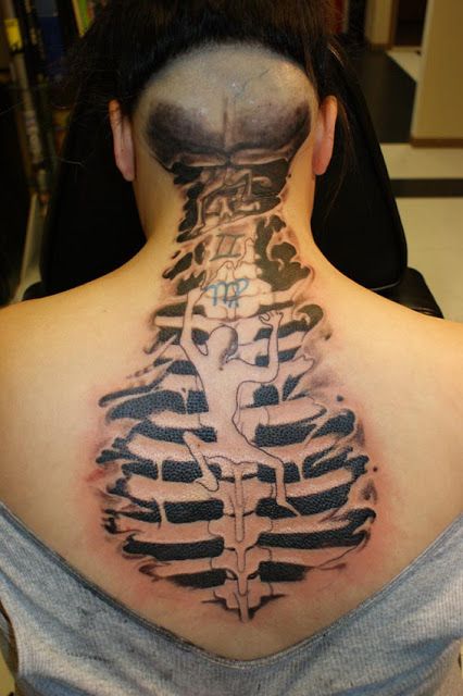 Black and Grey Gemini tattoo design for women on back and neck tattoo ideas