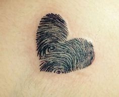 Fine line heart fingerprint tattoo design for women on chest tattoo ideas
