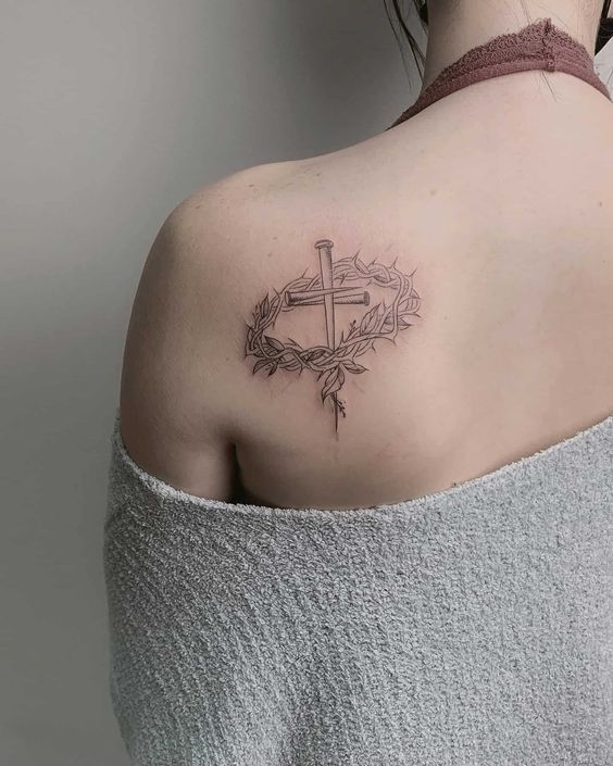 Fine Line cross and crown tattoo design for women on shoulder tattoo ideas