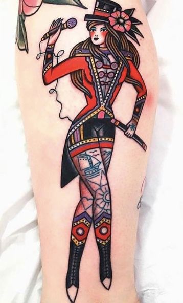 Traditional tattoo design of a woman with flowers, sun, and a ship for women on leg tattoo ideas
