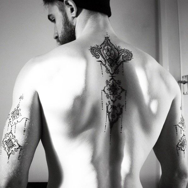 Henna floral tattoo design for men on back and arm tattoo ideas