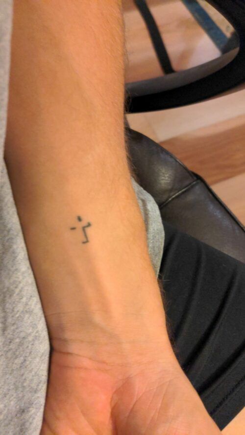 Minimalist stick figure tattoo design for men and women on wrist tattoo ideas
