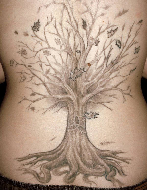 Sketchy tree and flower tattoo design for women on back tattoo ideas