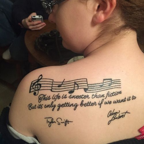 Musical notes and quote tattoo design for women on shoulder tattoo ideas